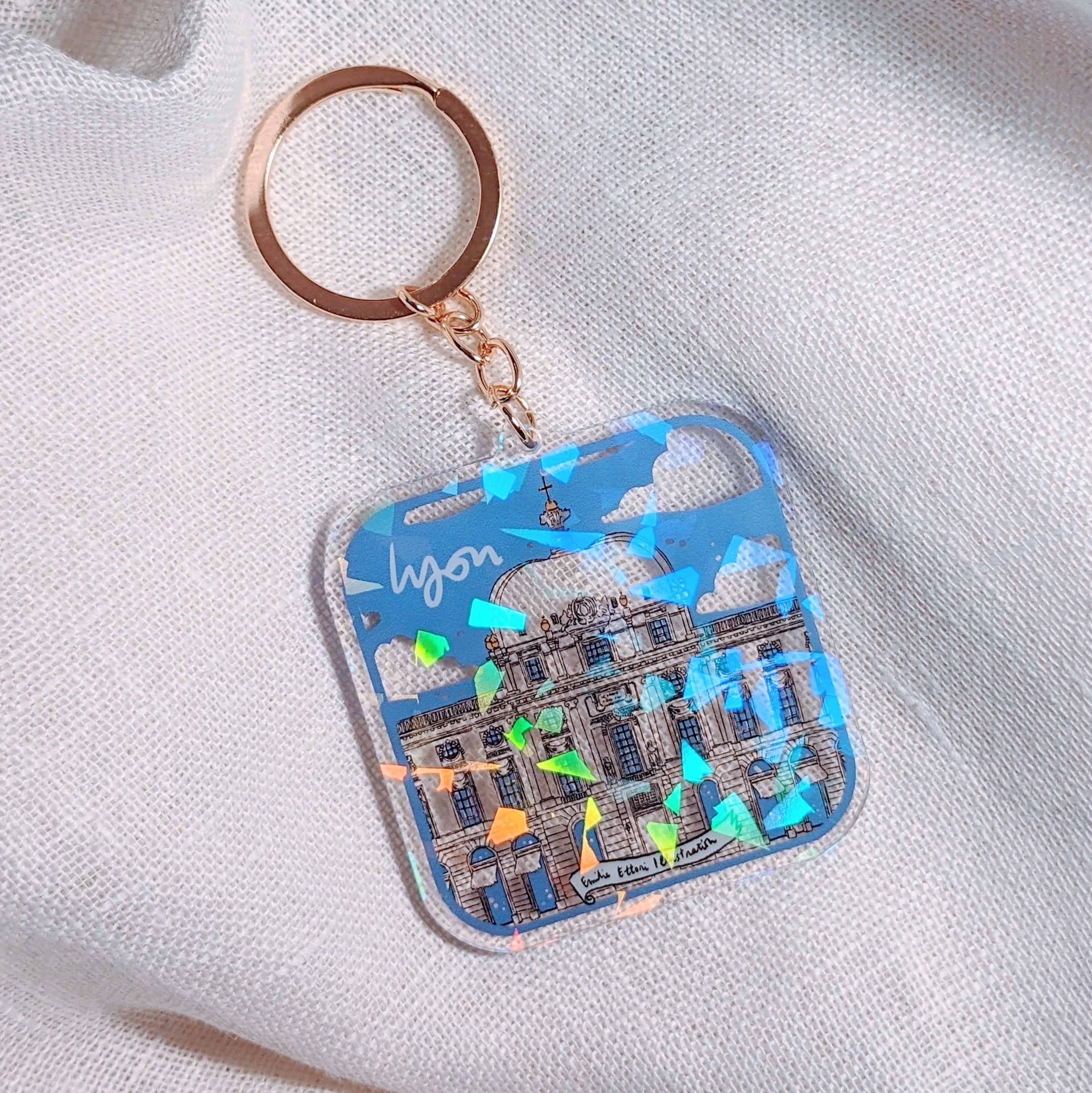 Porte-clé Hôtel Dieu bleu holographique